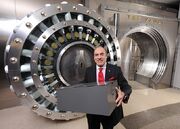 Muhtar-Kent-Coca-Cola-Company-CEO-is-placing-a-metal-box-which-the-company-says-contains-the-formula-inside-a-five-foot-high-safe-