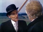 Time Lord Messenger Warns Doctor of Master's Presence